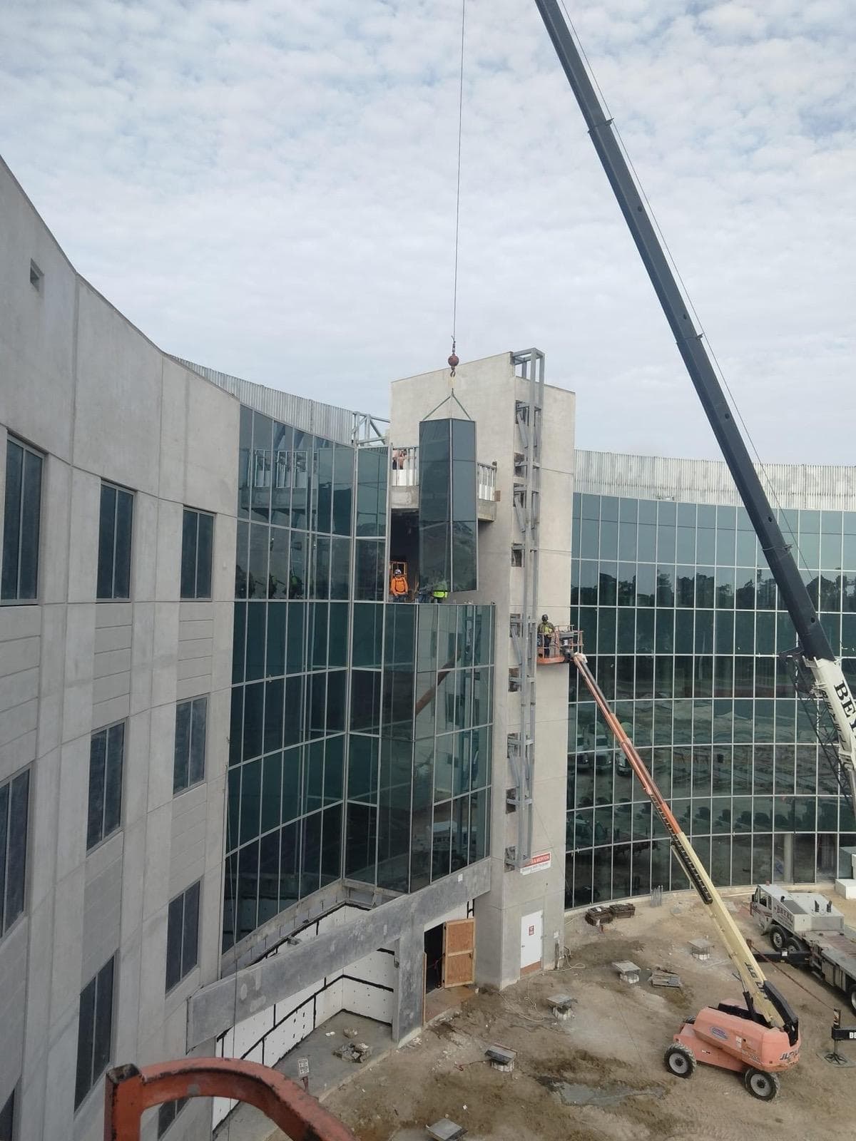 Athenas Services — glass panel installation project